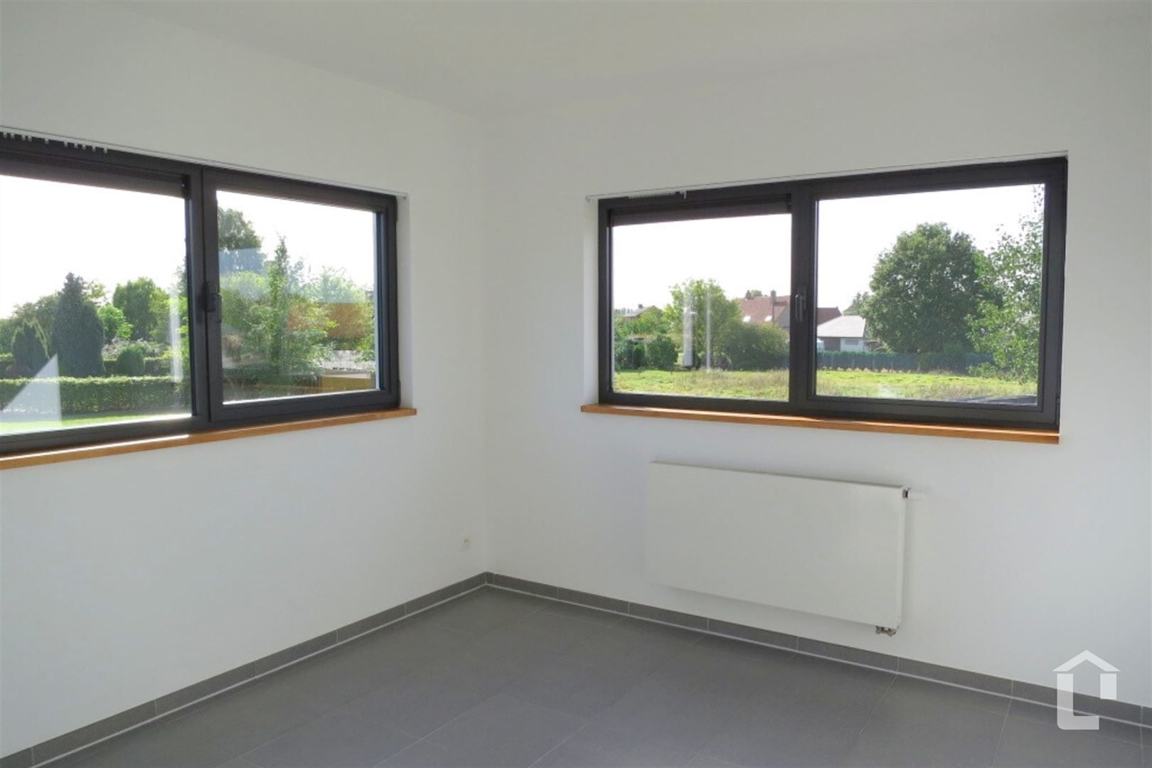Lichtrijke moderne woning in rustige woonwijk te Eke foto 7