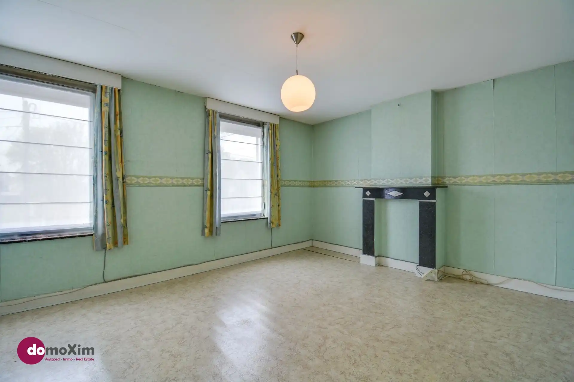 Te renoveren woning op bereikbare locatie in Boortmeerbeek foto 12