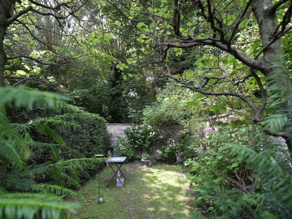 Karaktervolle burgerwoning met drie slaapkamers en een aangename, groene tuin op een uitstekende locatie in Gent. foto 28