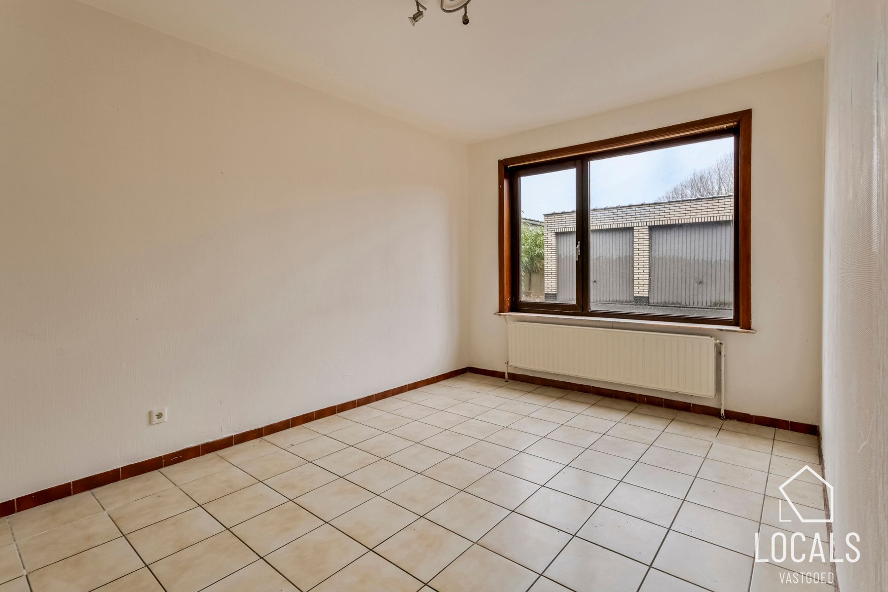 Huis ingericht als 3 appartementen te Denderleeuw foto 9