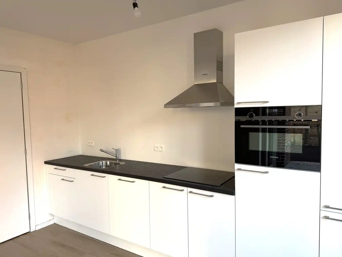 Prachtig gelijkvloers appartement met een gezellig terras en tuin in Lier! foto 6