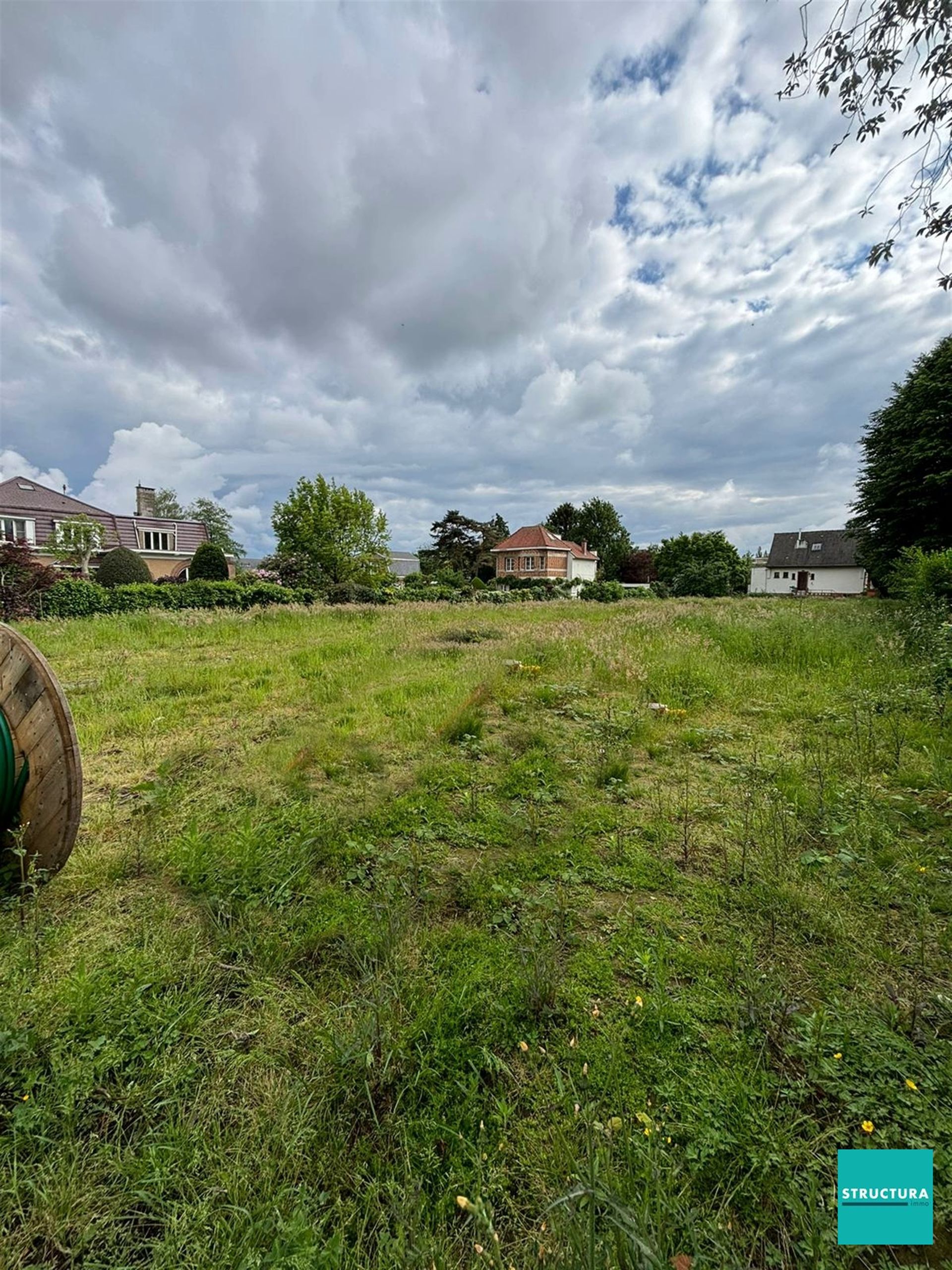 Bouwgrond voor halopen bebouwing op rustige ligging nabij tal van faciliteiten!  foto 1