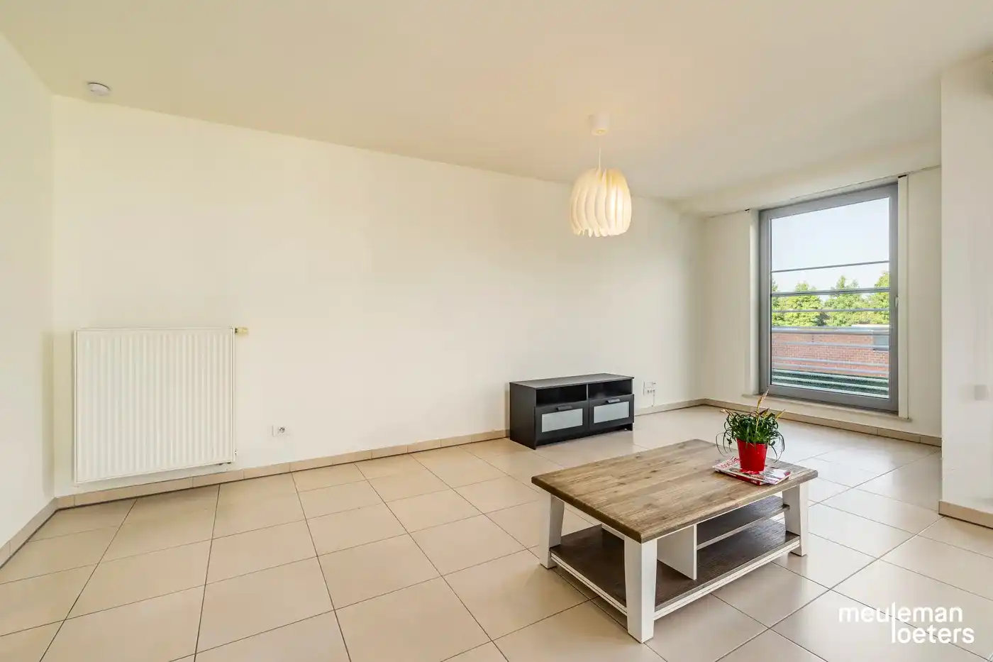 Lichtrijk driegevel appartement met ondergrondse garagebox foto 4