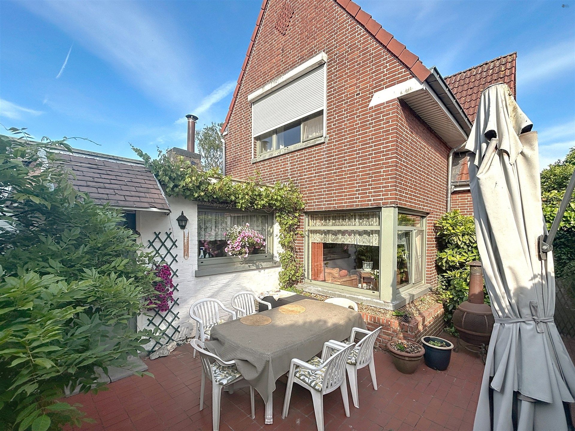 Charmante open bebouwing met ruime zonnige tuin en een aparte garage op perceel van 522m² foto 12