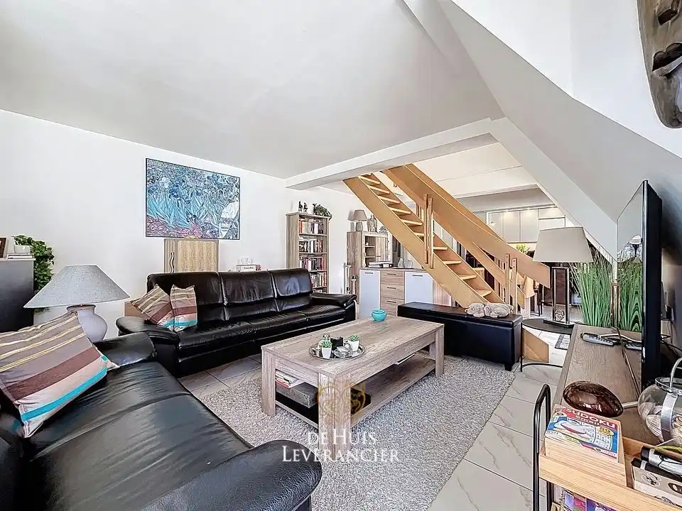 Uw eigen plek aan zee: stijlvol duplex-appartement met 3 slpks in het hart van Koksijde foto 11