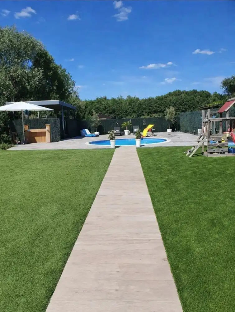 Stijlvolle, instapklare woning met vier slaapkamers, twee badkamers en verwarmd zwembad te koop in Lanaken foto 66