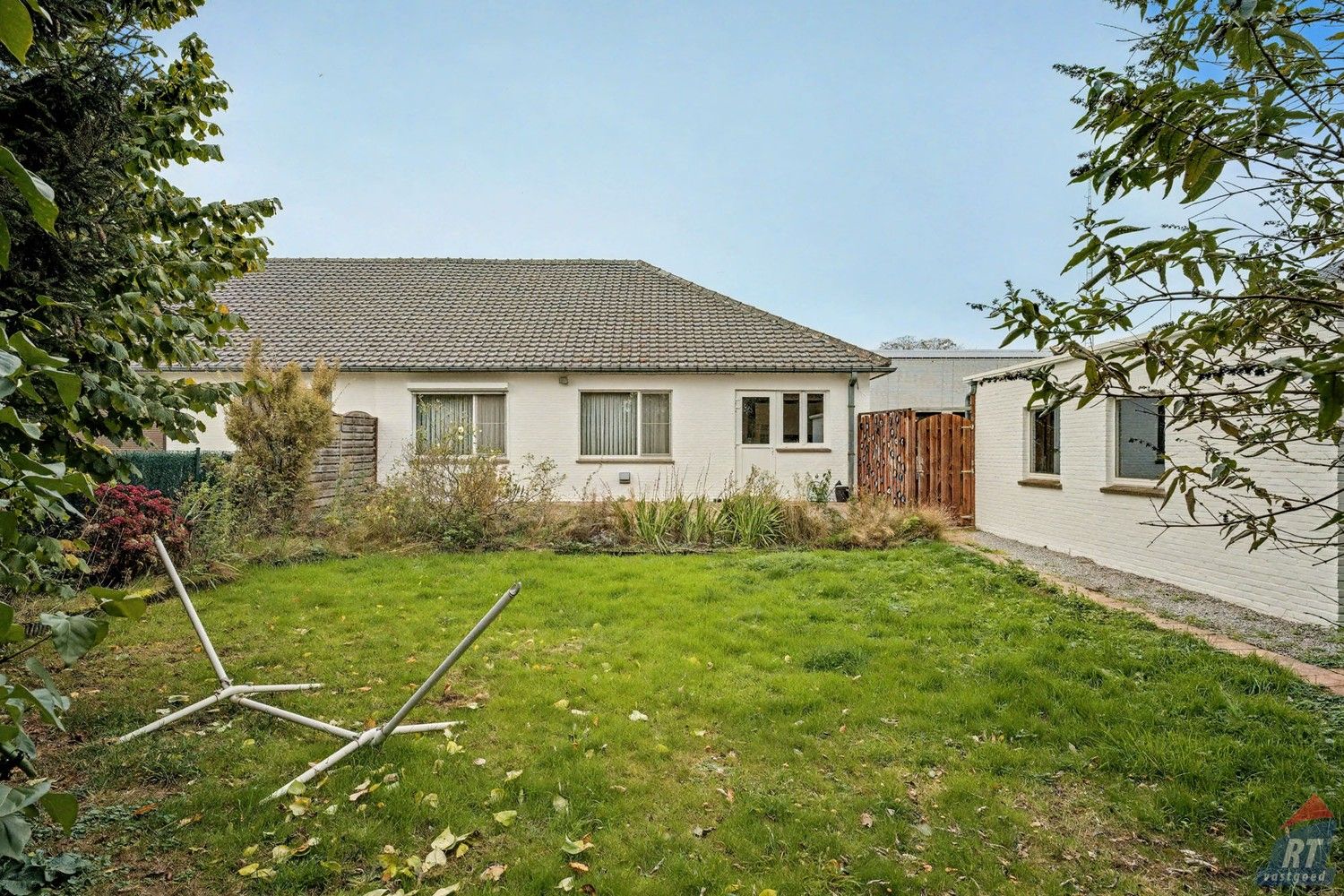 Gelijkvloerse halfopen woning met tuin en renovatiepotentieel in het hart van Sint-Truiden foto 21