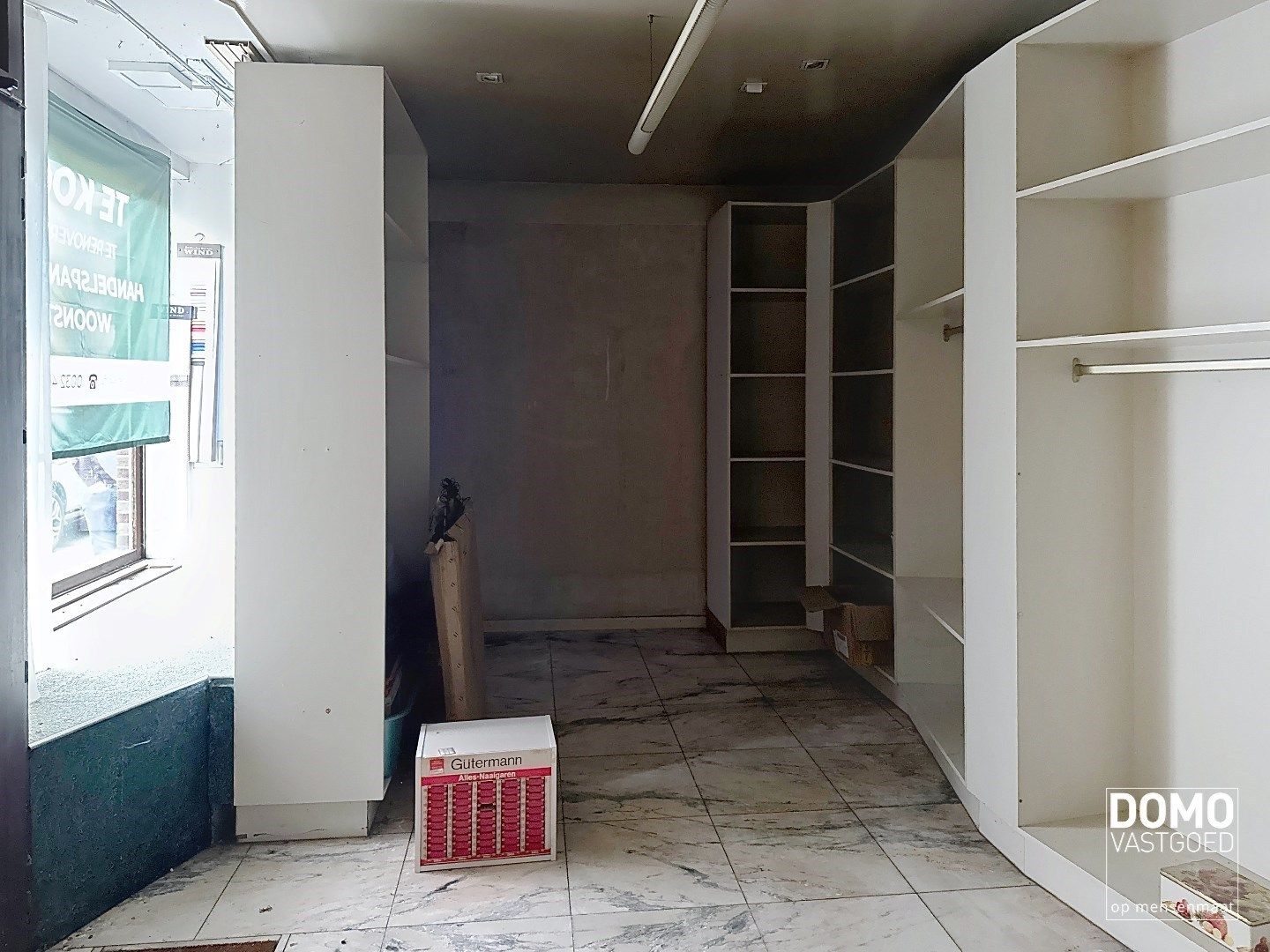 Te renoveren handelshuis gelegen in het centrum van Diepenbeek. foto 16