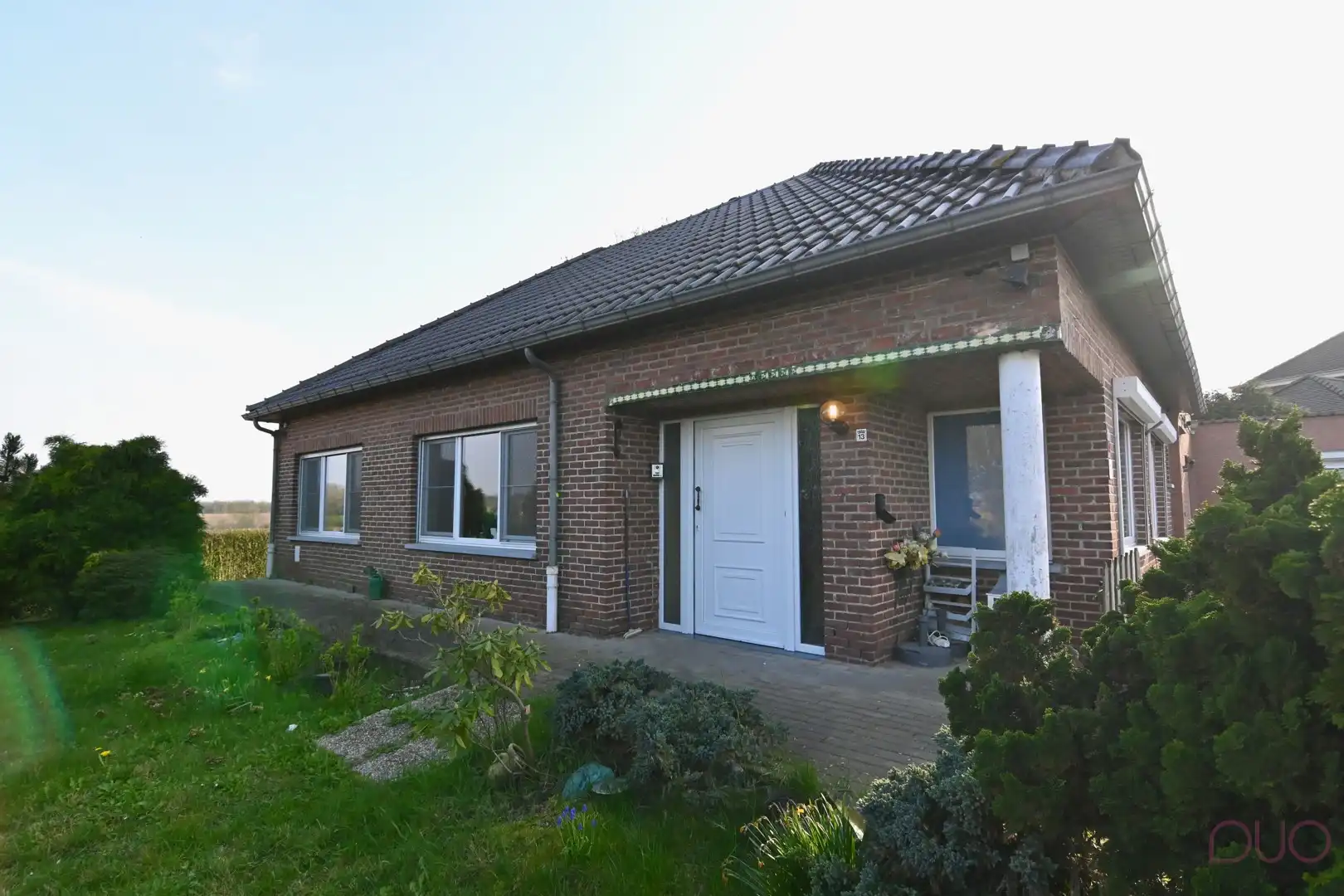 Hoofdfoto van de publicatie: Gelijkvloerse woning gelegen in het midden van de Haspengouwse velden