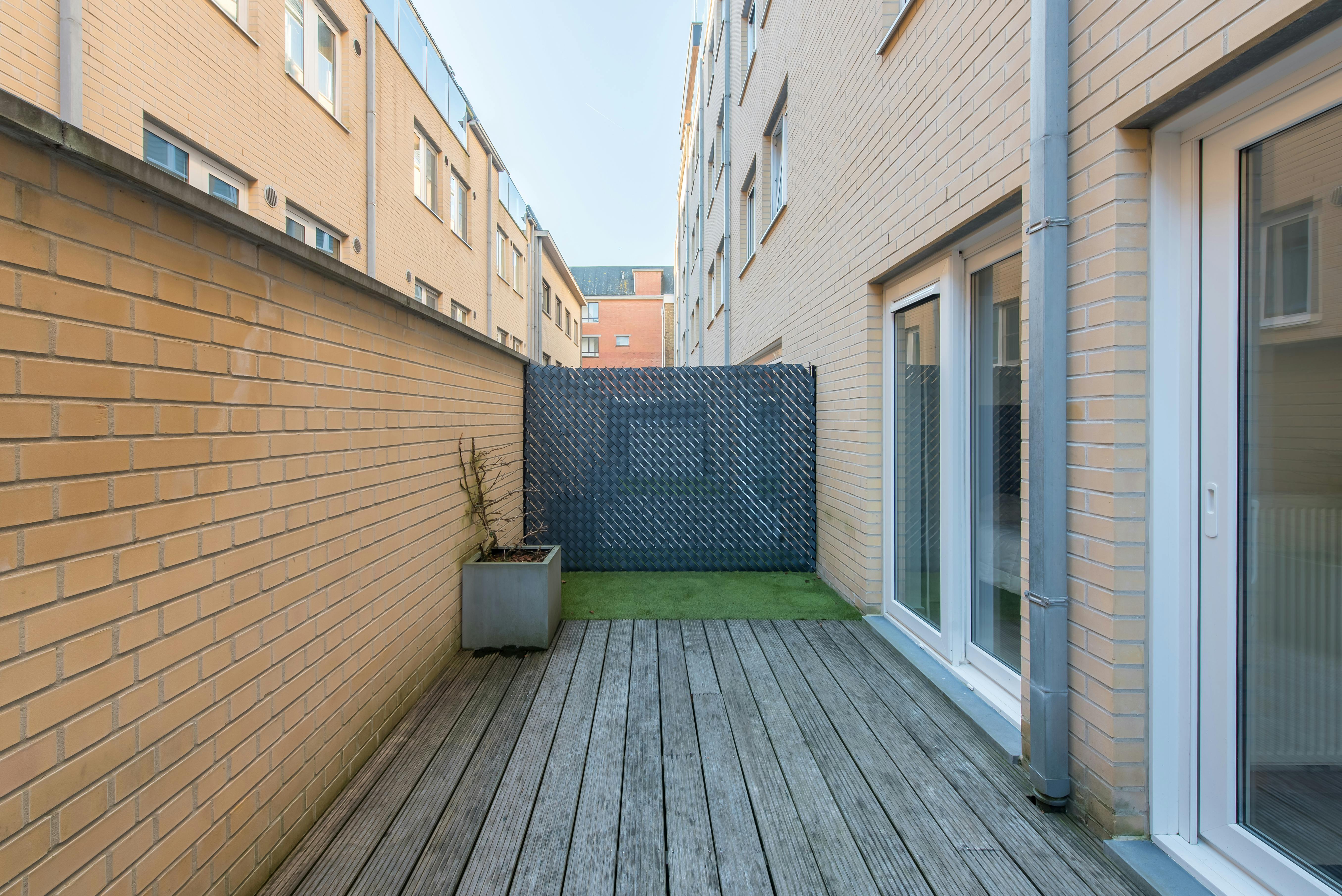 Recent gelijkvloers appartement met 2 slaapkamers en terras! foto 6