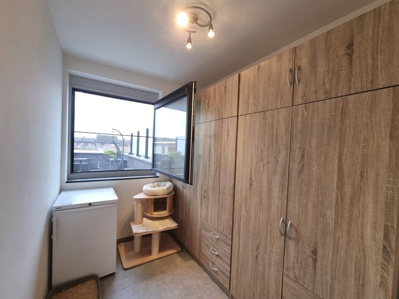 Appartement in Melsele met twee slaapkamers, groot zonnig terrassen en carport foto 11