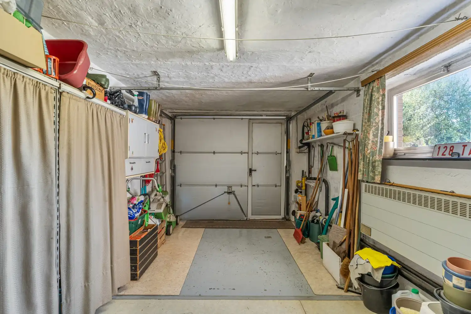 Rustig gelegen woning met 4 slaapkamers, een garage en een tuin in een doodlopende straat te Kessel-Lo! foto 16