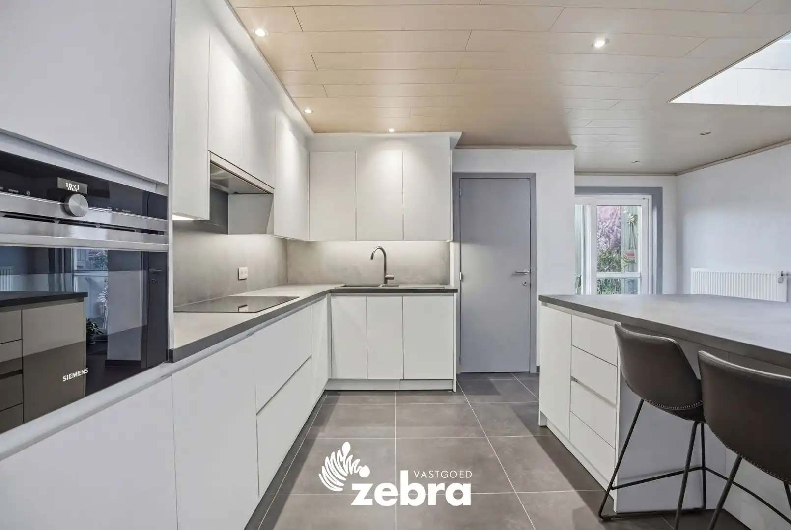 Instapklare woning met 3 slaapkamers en 2 badkamers in Roeselare! foto 6