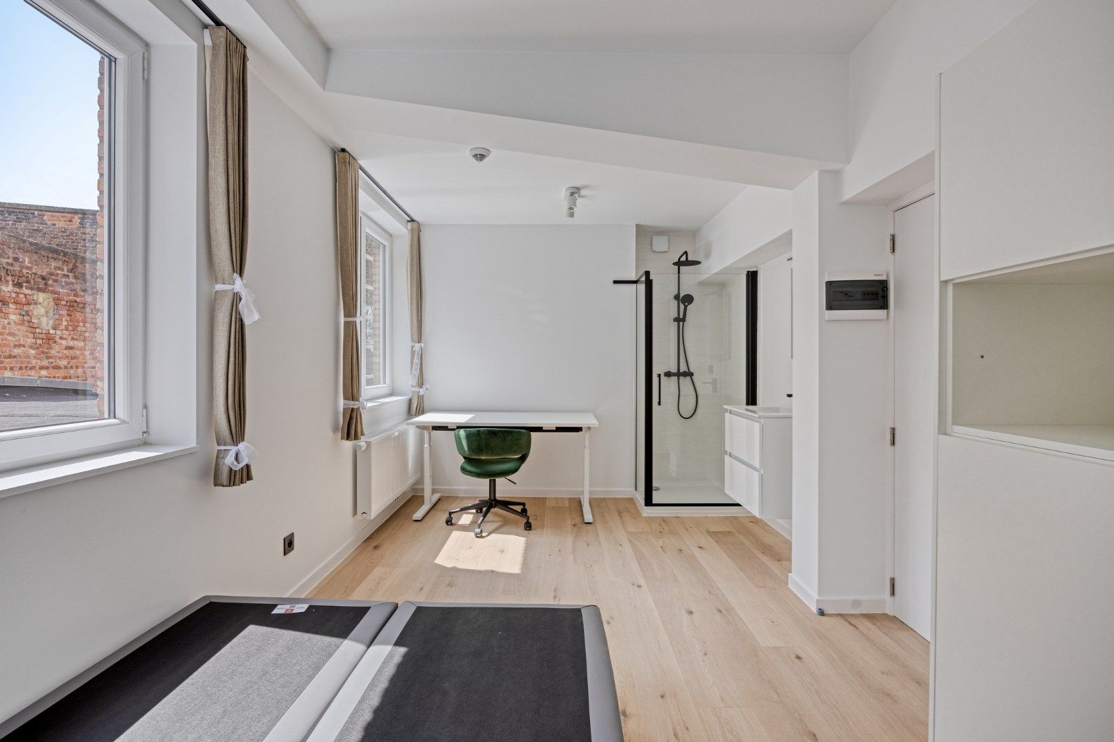 Volledig gerenoveerde studentenkamer in residentie met 29 studentenkamers in hartje Leuven - EPC label A! foto 6