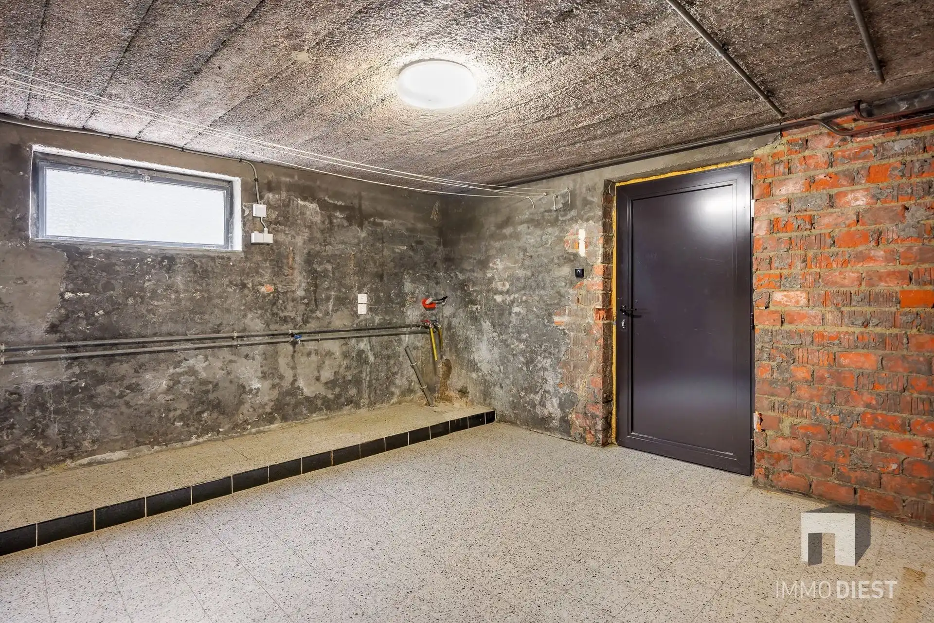 Op te knappen betaalbare split-level woning te Schaffen, kort bij de Bossen van Hees foto 7