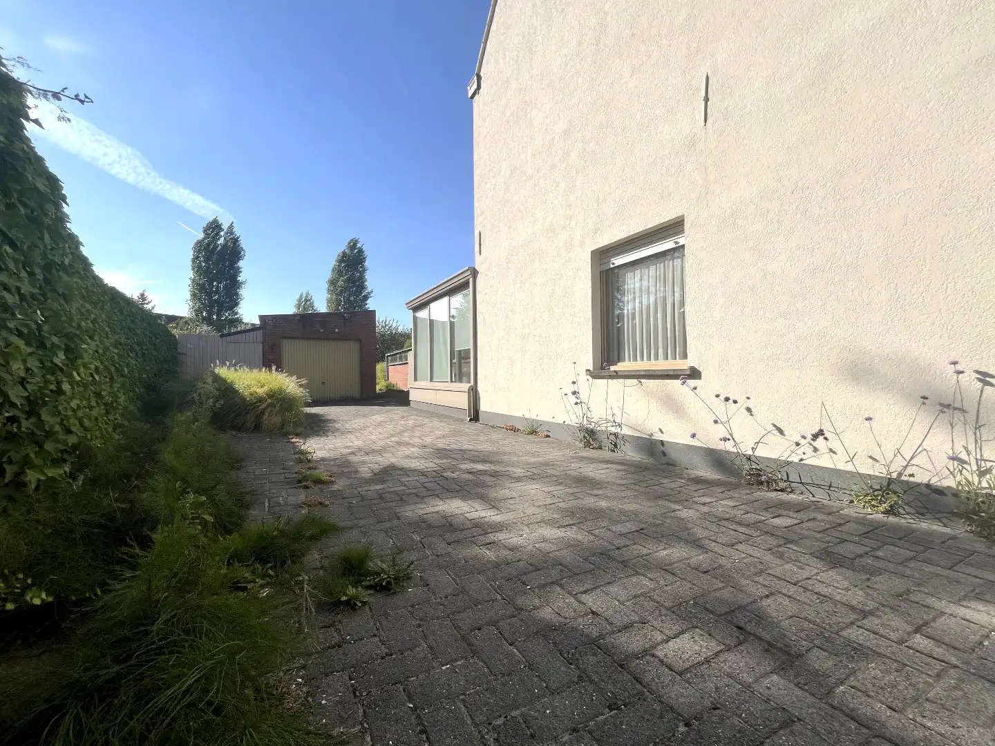 Halfopen 4-slpkr woning met tuin & garage foto 3