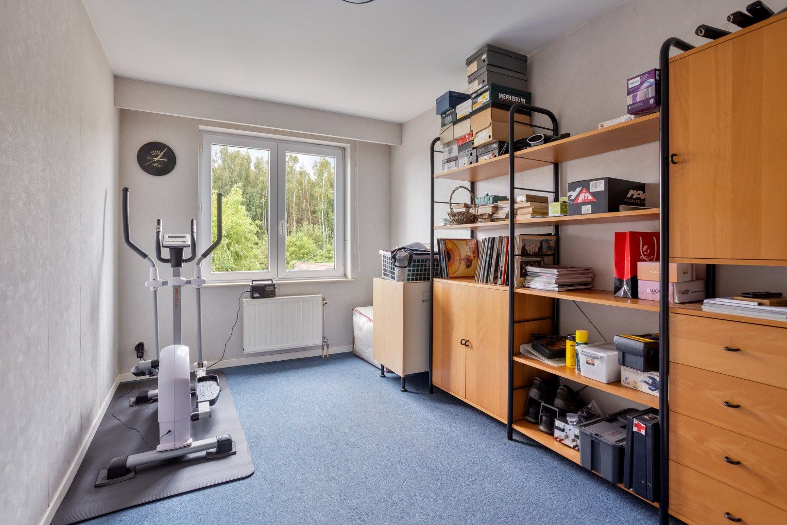 Ruim en goed onderhouden 2 slpk appartement met terras en garage foto 15