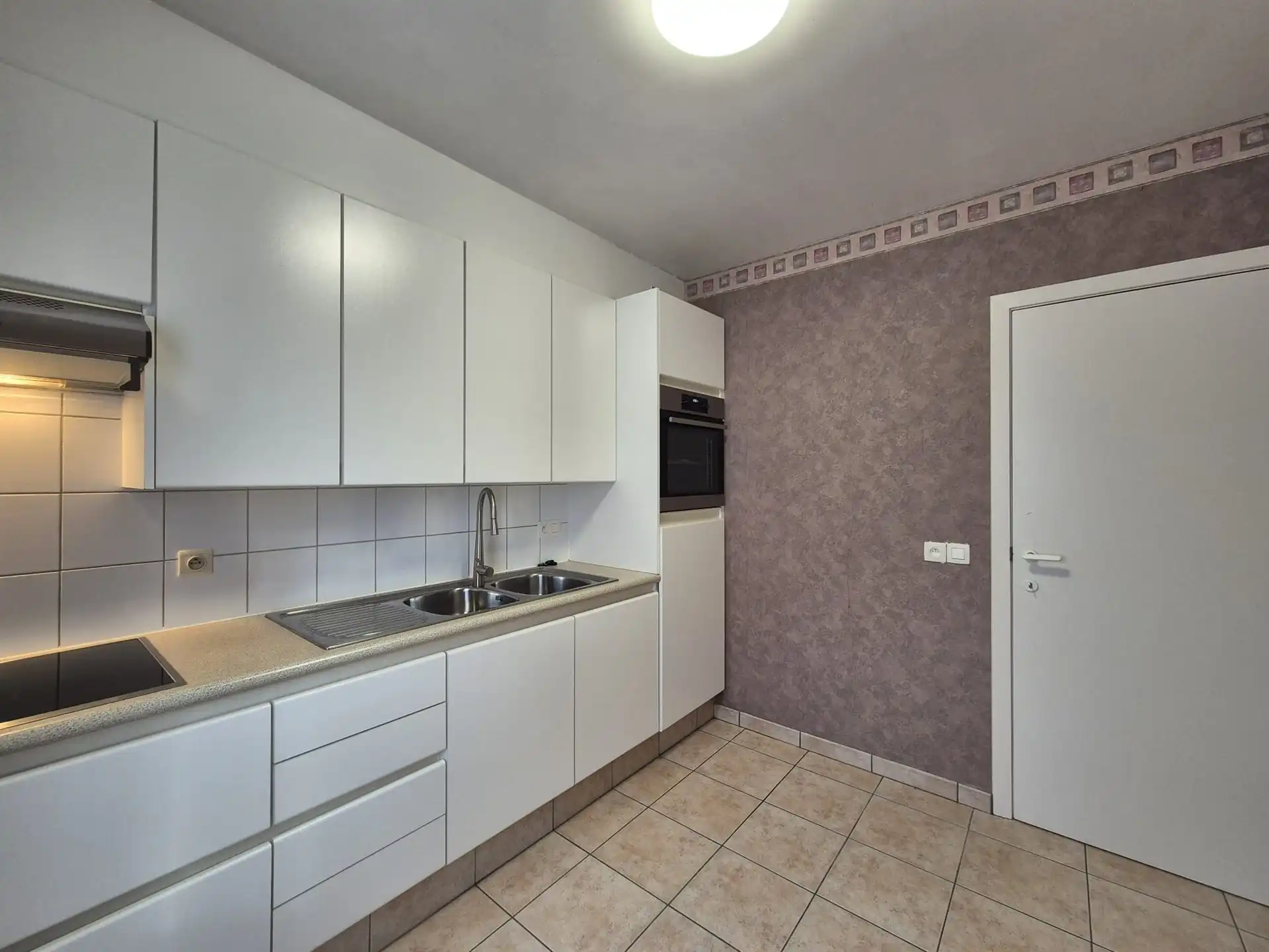 Ruim appartement met garage gelegen op het eerste verdiep vlakbij de Warande. foto 13