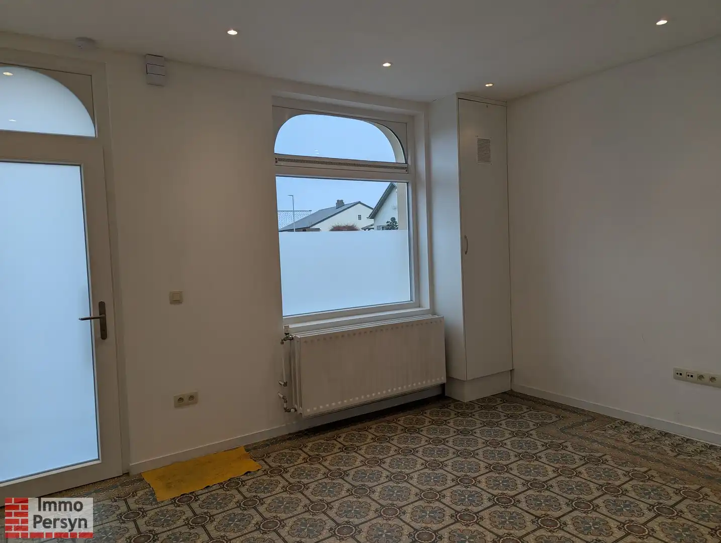 Rustig gelegen gezinswoning met tuintje foto 3