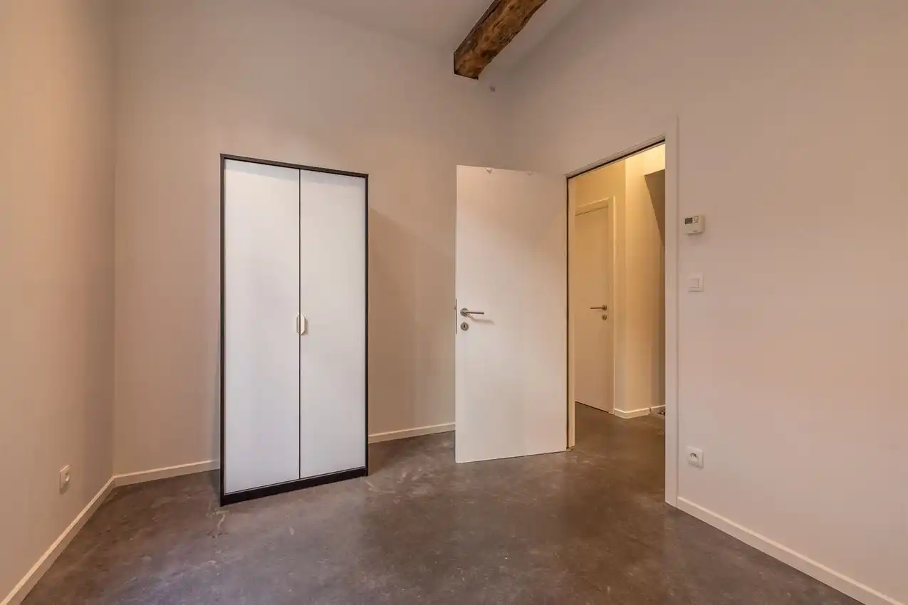 Ruim gelijkvloers appartement met zonnige tuin op toplocatie foto 17