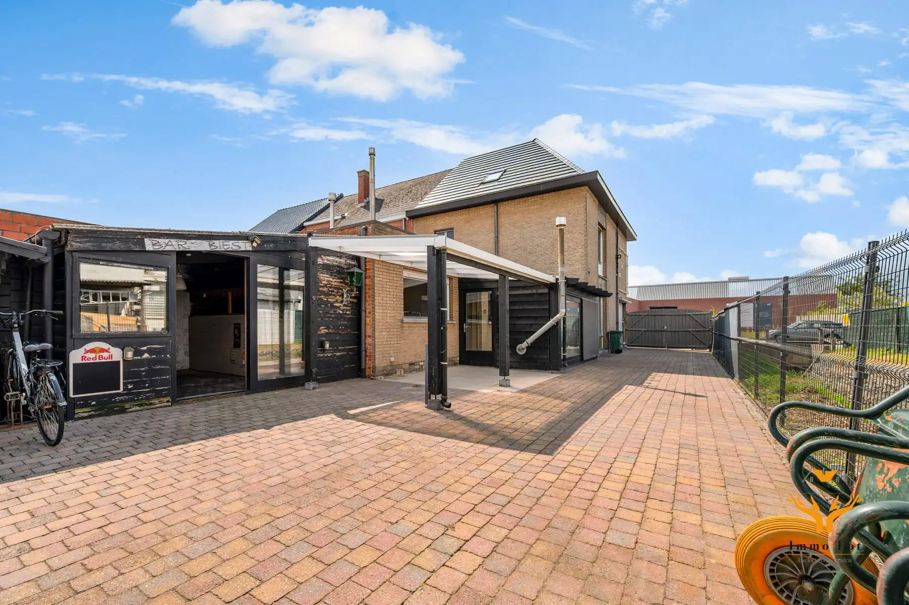 Halfopen bebouwing met tuin en garage in centrum Kalken foto 22