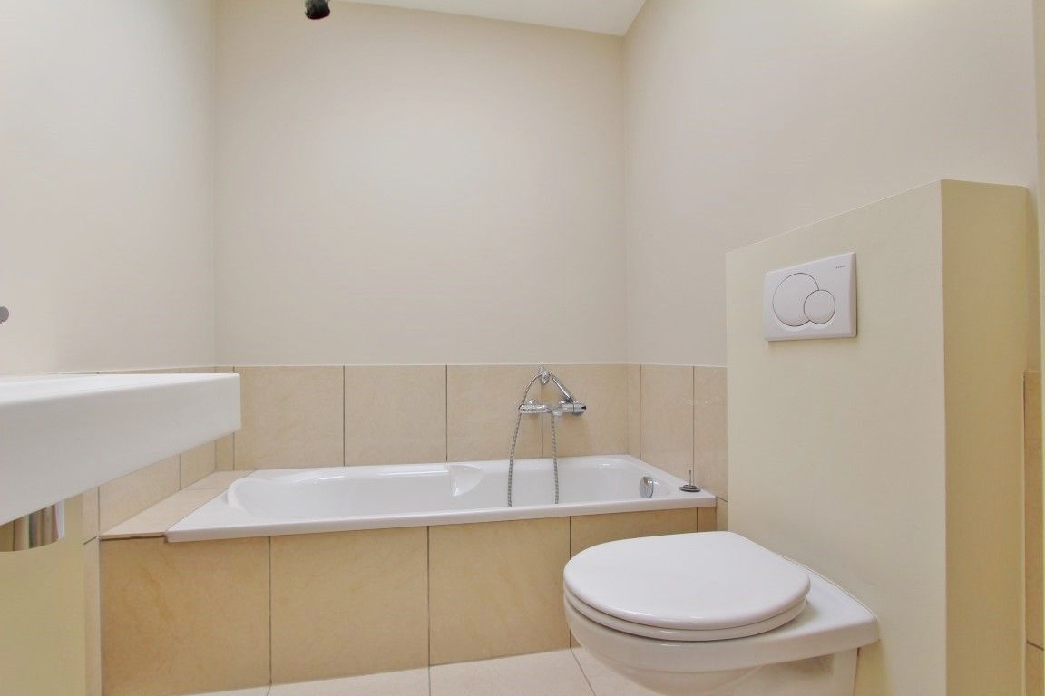 Ruim duplex appartement te huur in het centrum van Sint-Truiden foto 18