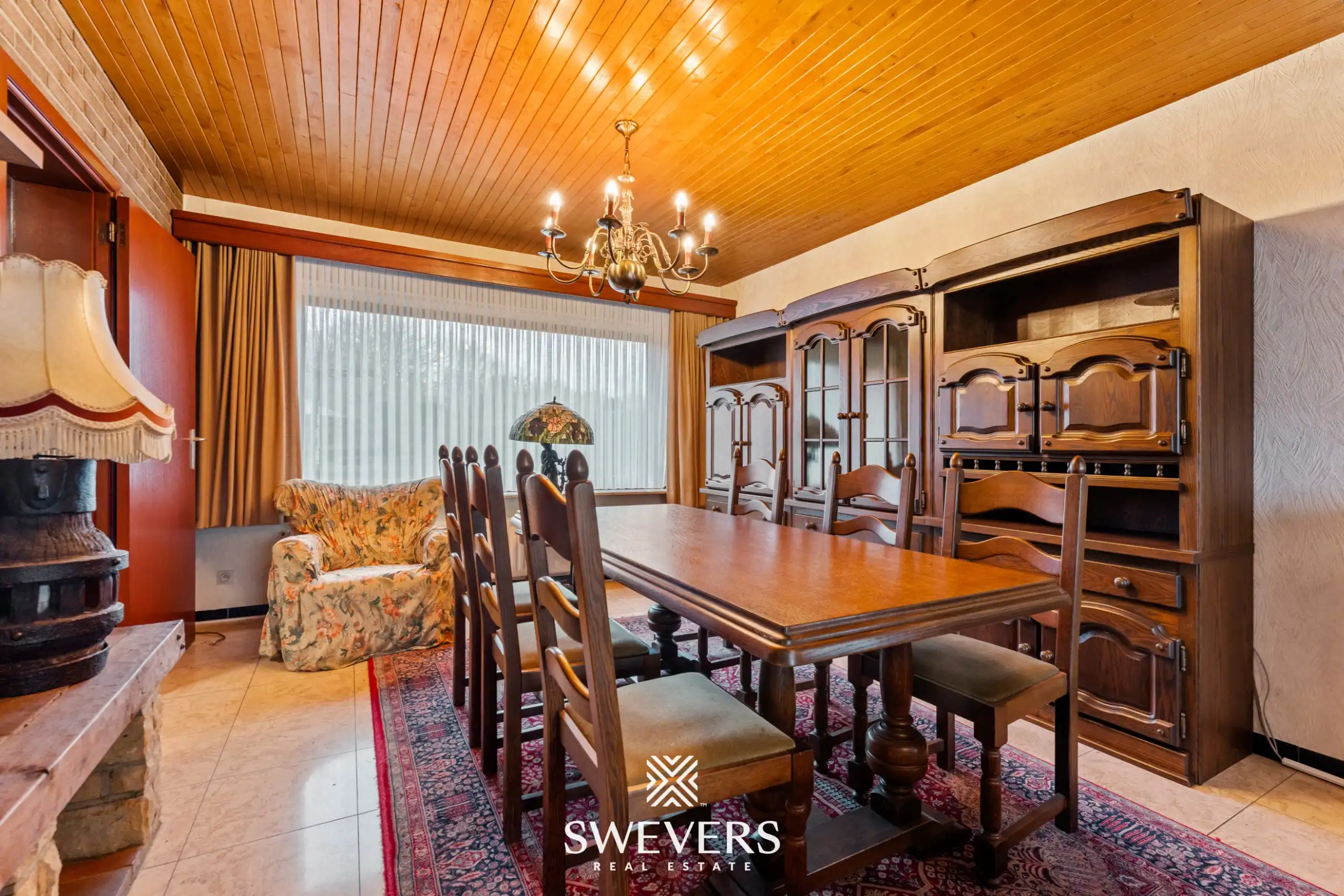 Open bebouwing met drie slaapkamers op uitzonderlijk groot perceel van 1.897 m² foto 7