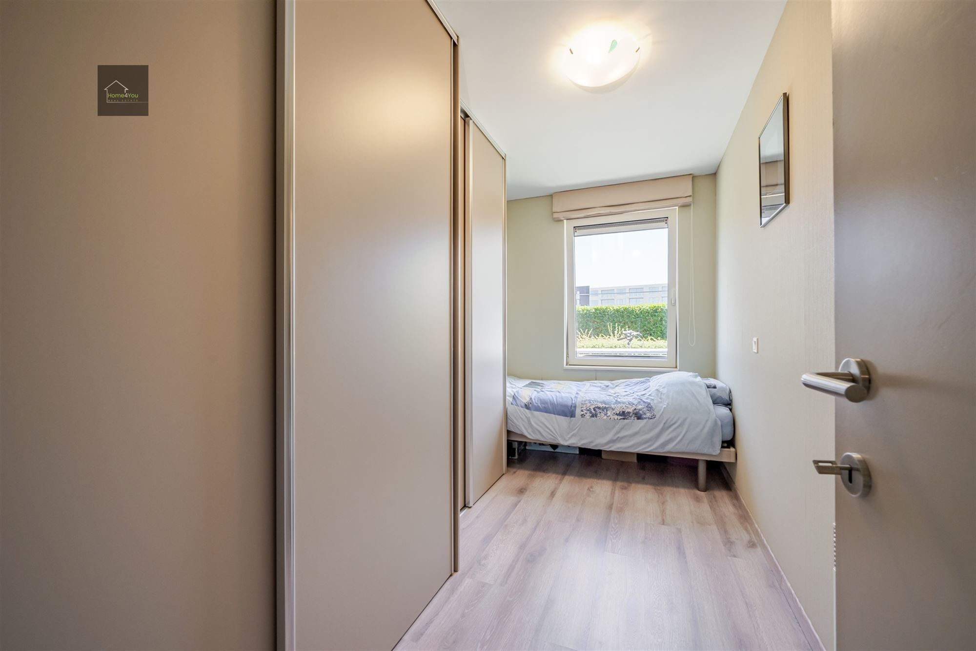 Instapklaar ruim gelijkvloersappartement met tuin! foto 8