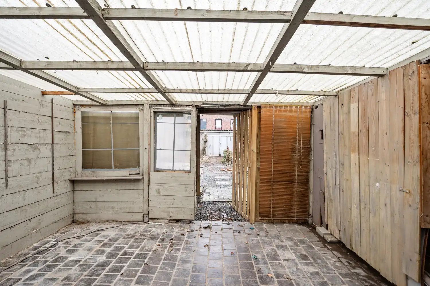 Te renoveren woning met tuin en garage in centrum Wijnegem! foto 15