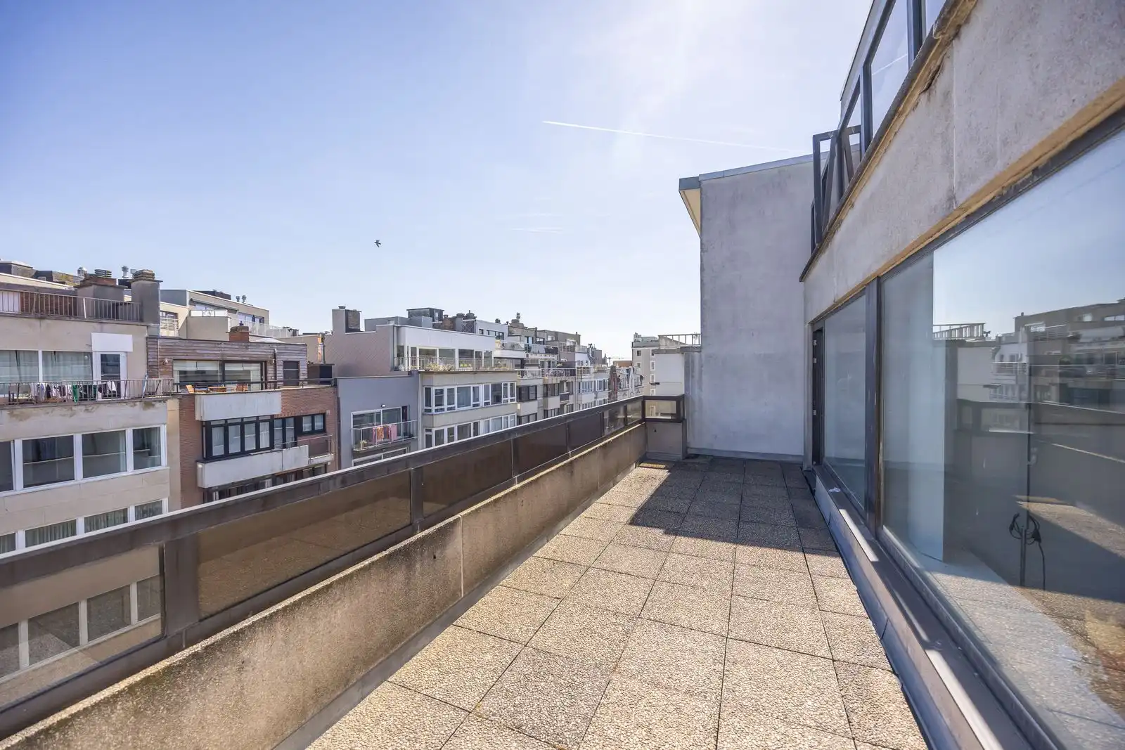 Exclusief duplex penthouse met 4 slpk en zonnige terrassen pal aan zee foto 12