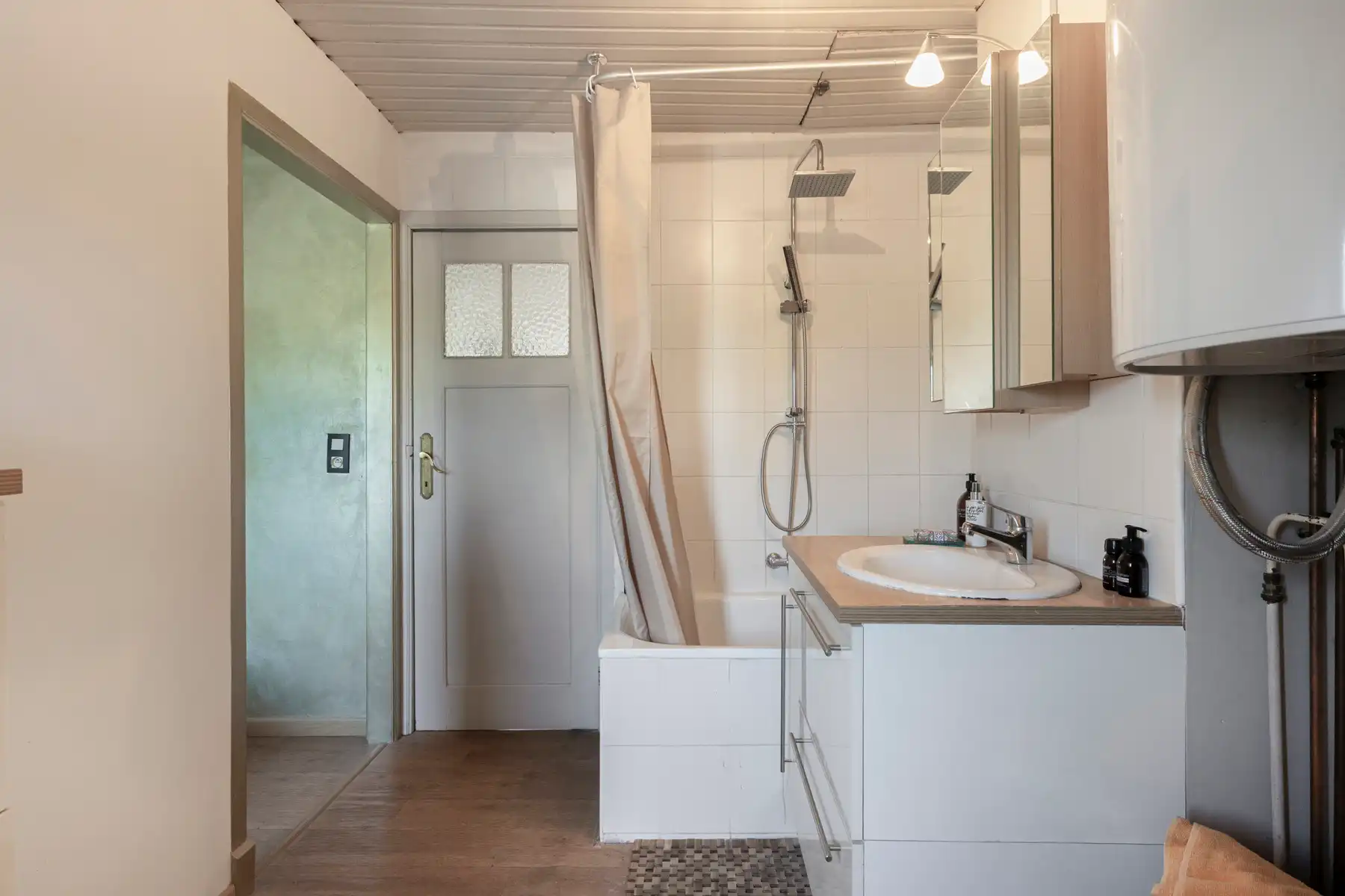 Instapklare woning met gezellige tuin en terras in het centrum van Opwijk! foto 23