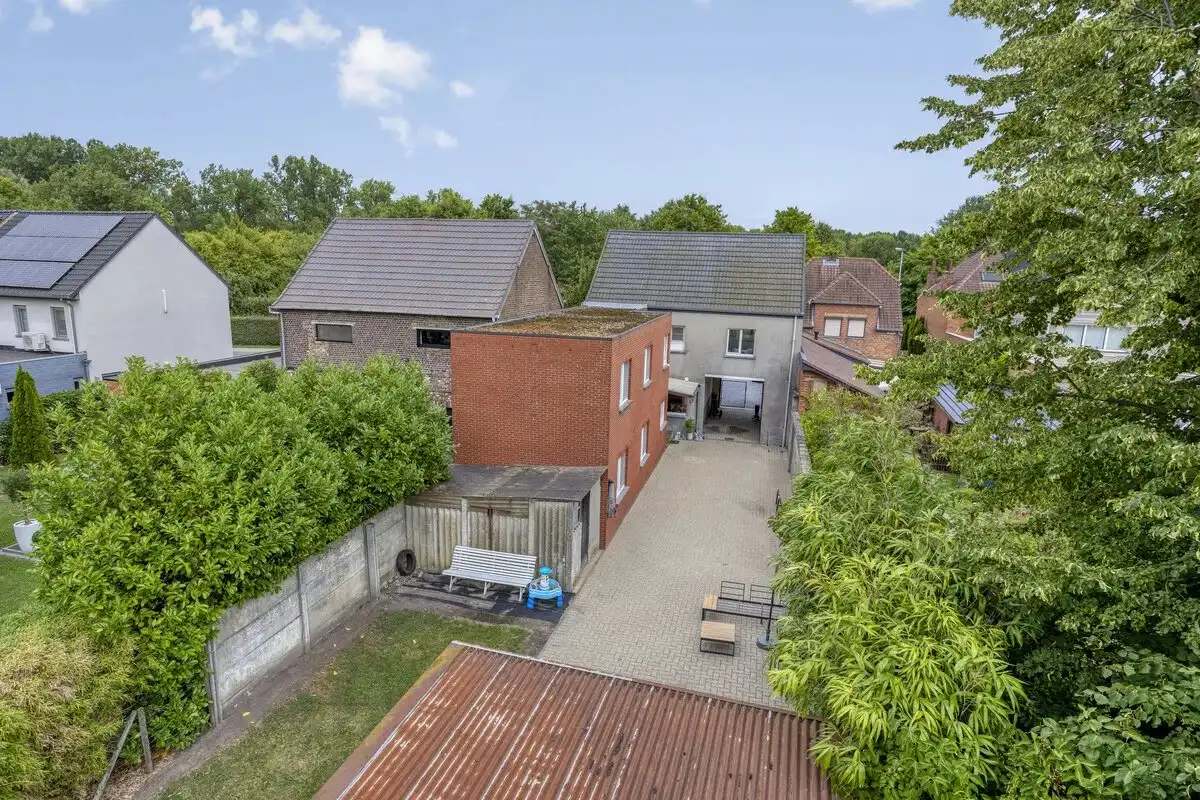 OPBRENGSTEIGENDOM BESTAANDE UIT TWEE RUIME EN VERHUURDE APPARTEMENTEN IN HERK-DE-STAD foto 5
