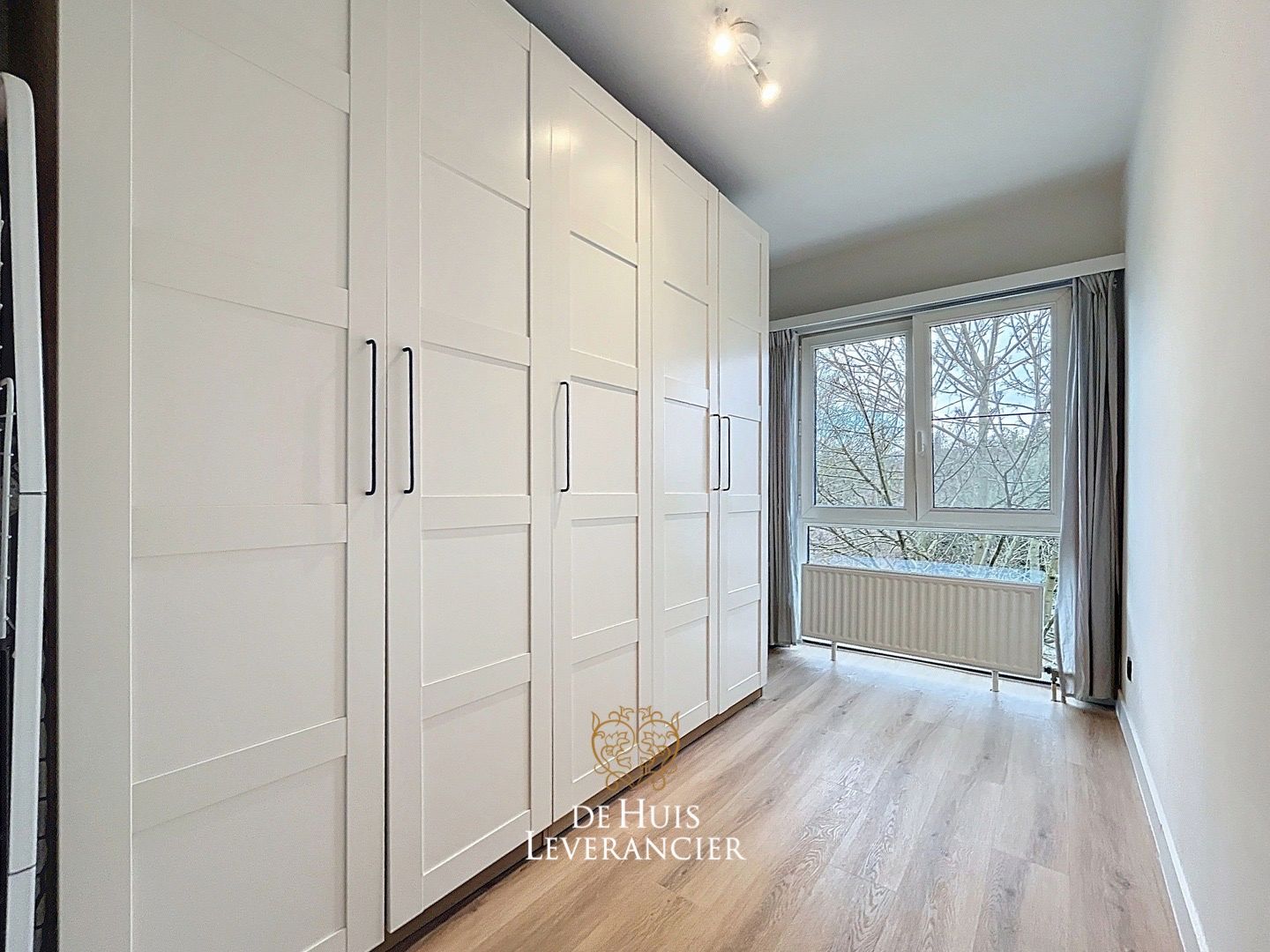 Gerenoveerd appartement met 2 slaapkamers, garagebox en berging te koop in Edegem foto 21