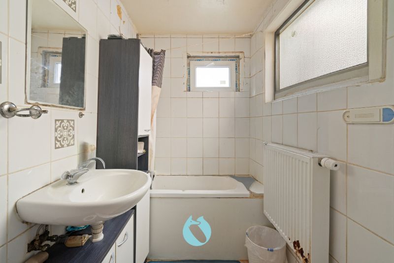 Ruime woning met 4 slaapkamers en grote tuin foto 6