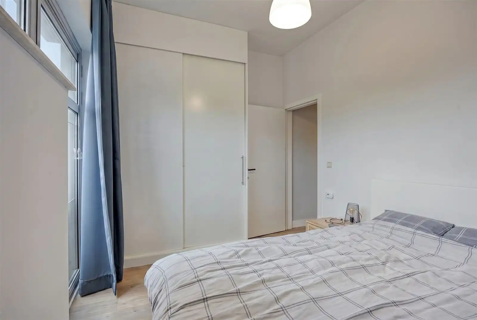 Instapklaar gemeubeld gelijkvloers appartement met tuin nabij het centrum van Edegem foto 11