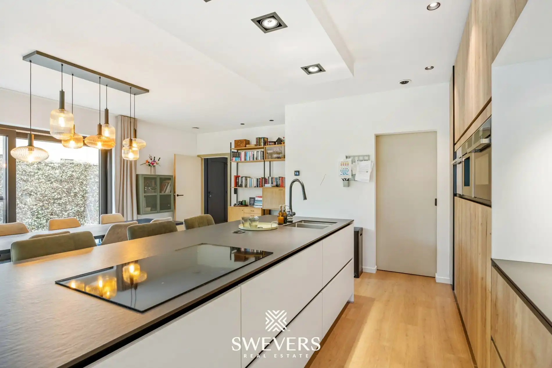 Recente halfopen bebouwing met 5 slaapkamers met verrassend grote tuin in Houthalen foto 9