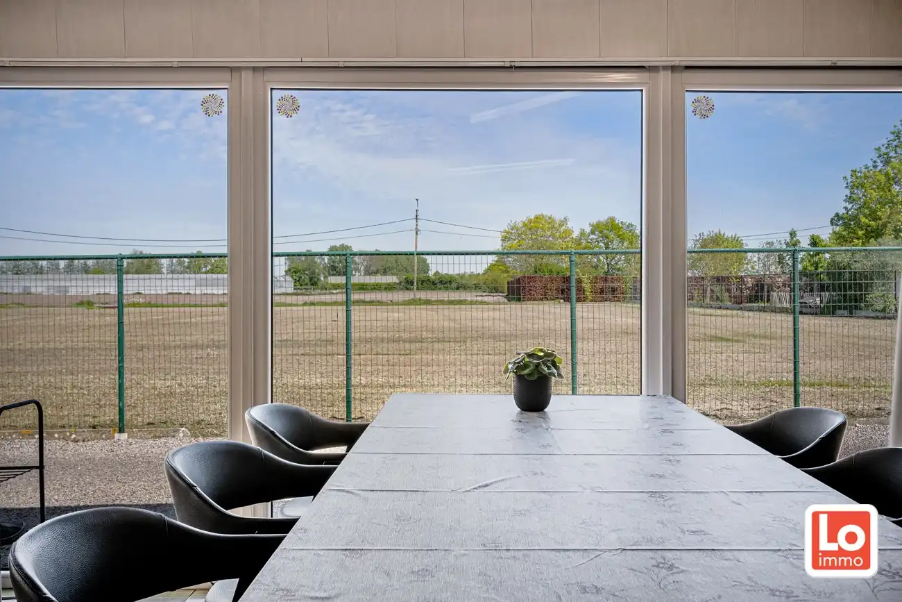 Landelijk gelegen half open woning met ruim bijgebouw (ca. 65m) en grote tuin met open zicht tussen Hijfte en Lochristi. foto 17