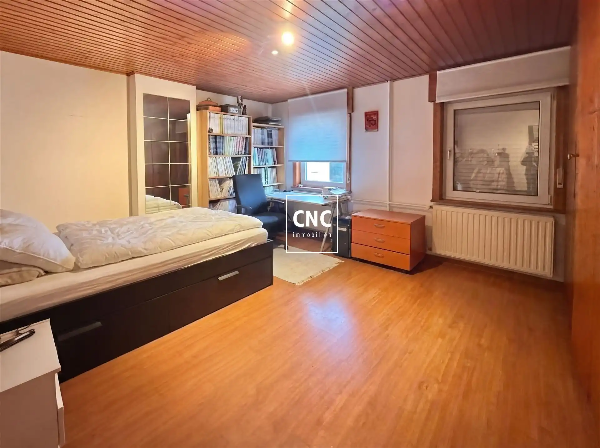 Rijwoning met renovatiepotentieel in het hart van Heist foto 14