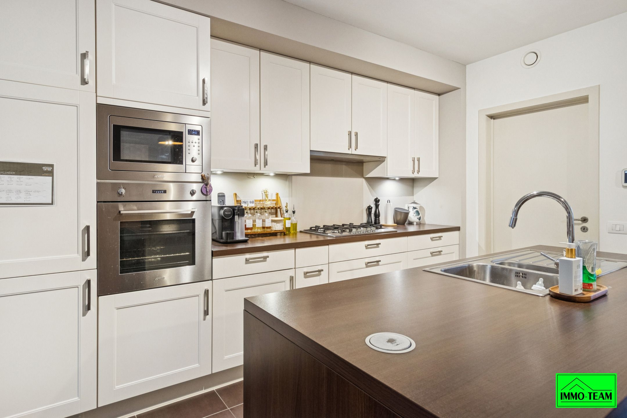 Gezellige  2-gevelwoning met 3 slks, tuin en garage foto 11