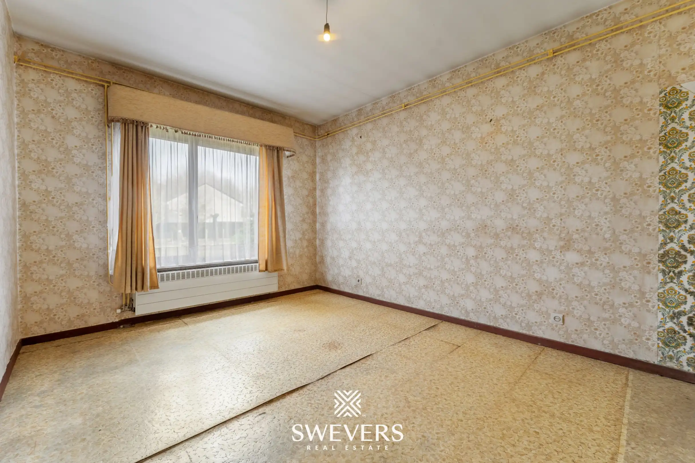 Charmante woning met ruime tuin en renovatiemogelijkheden in Halen foto 13