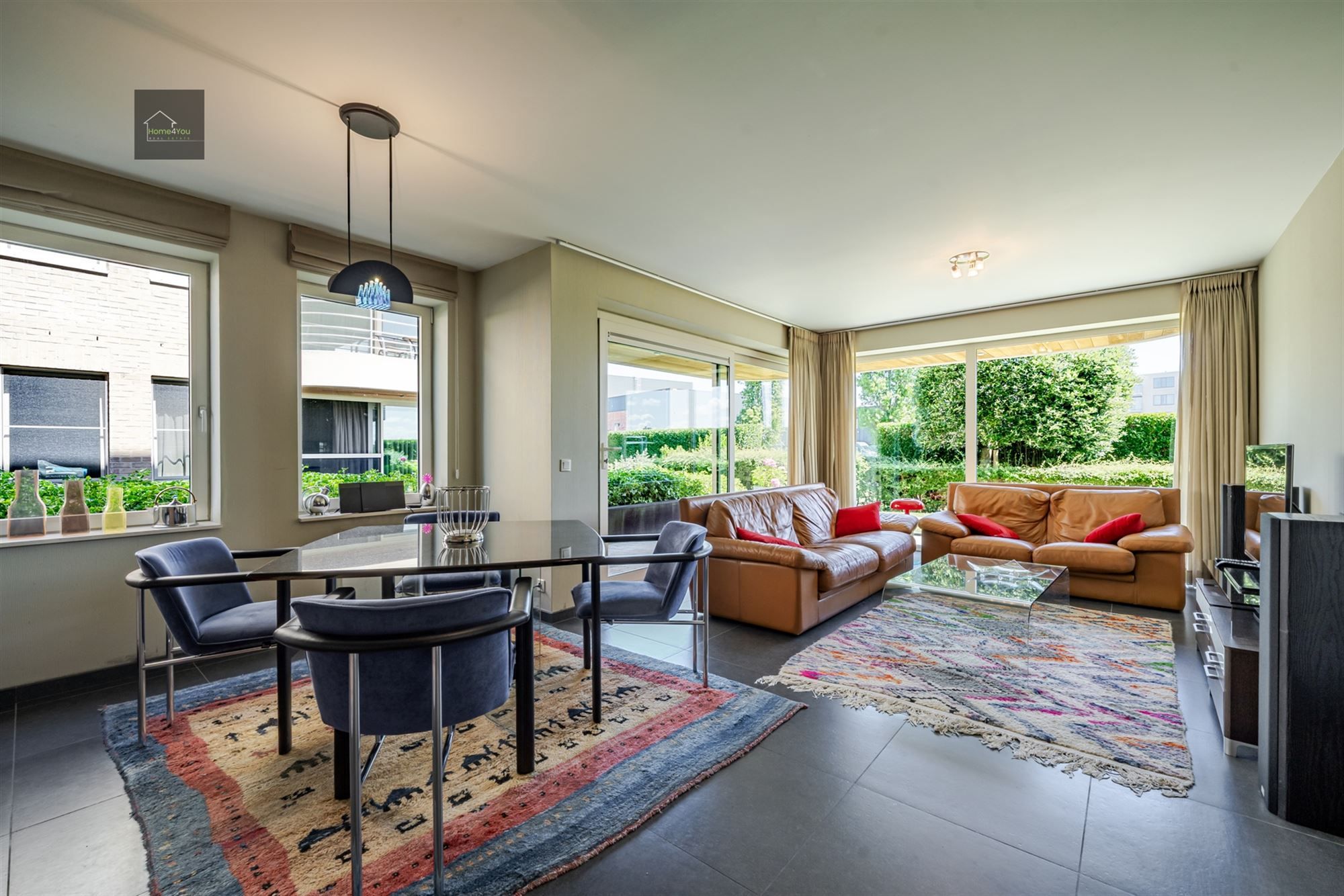 Instapklaar ruim gelijkvloersappartement met tuin! foto 3