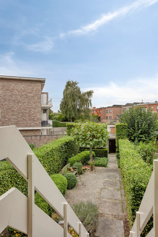 Mooie bel-étagewoning met 3 slks, garage, zomerkeuken en tuin! foto 22