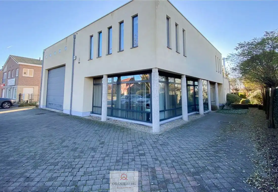 Magazijn met kantoor en woonst foto 2