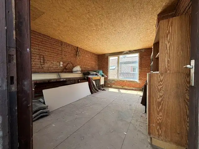 Centraal gelegen  te moderniseren huisje met 2 slaapkamers , overdekt terrasje en klein ateliertje. foto 9