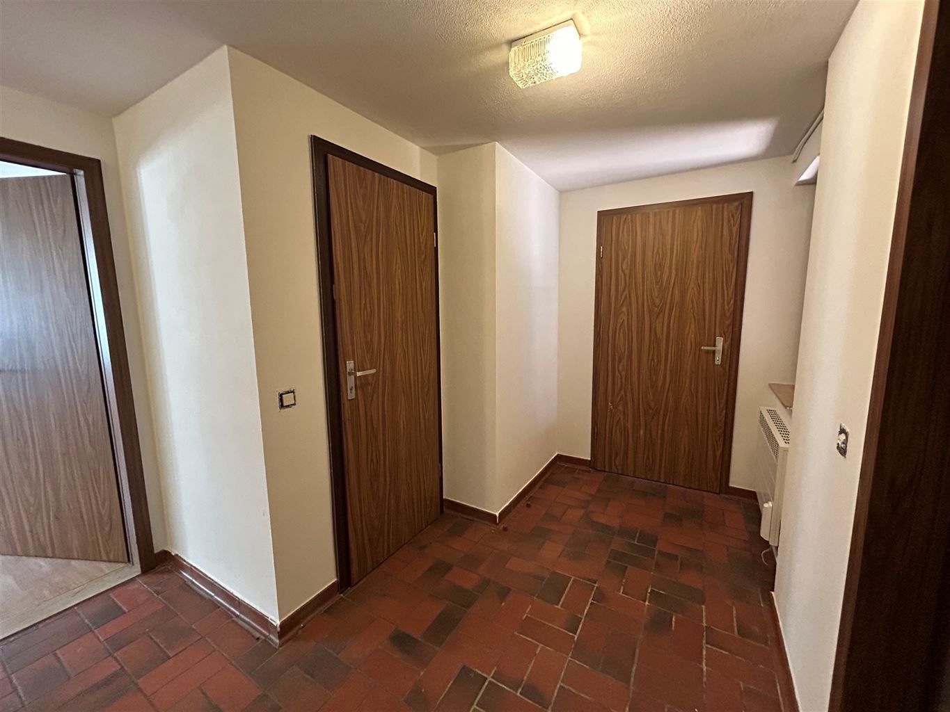 Ruim appartement met 2 slaapkamers en terrasje aan de Markt van Maaseik foto 7