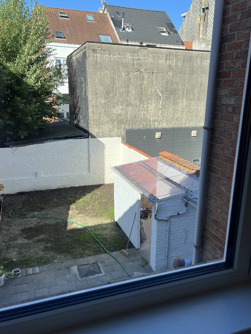 Goed gelegen rijwoning met tuintje foto 28
