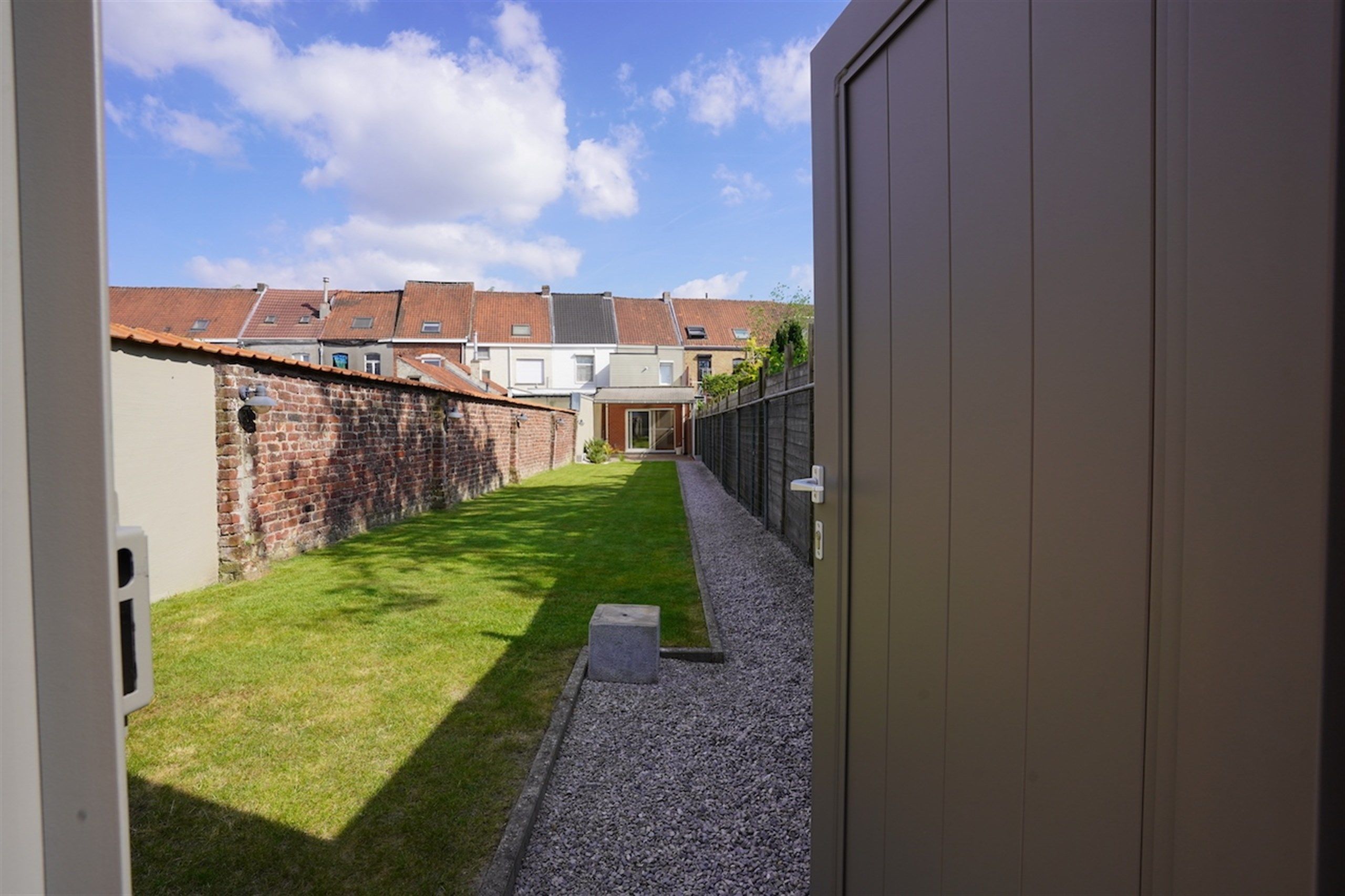 Instapklare woning met mooie tuin en privé garage achteraan foto 12