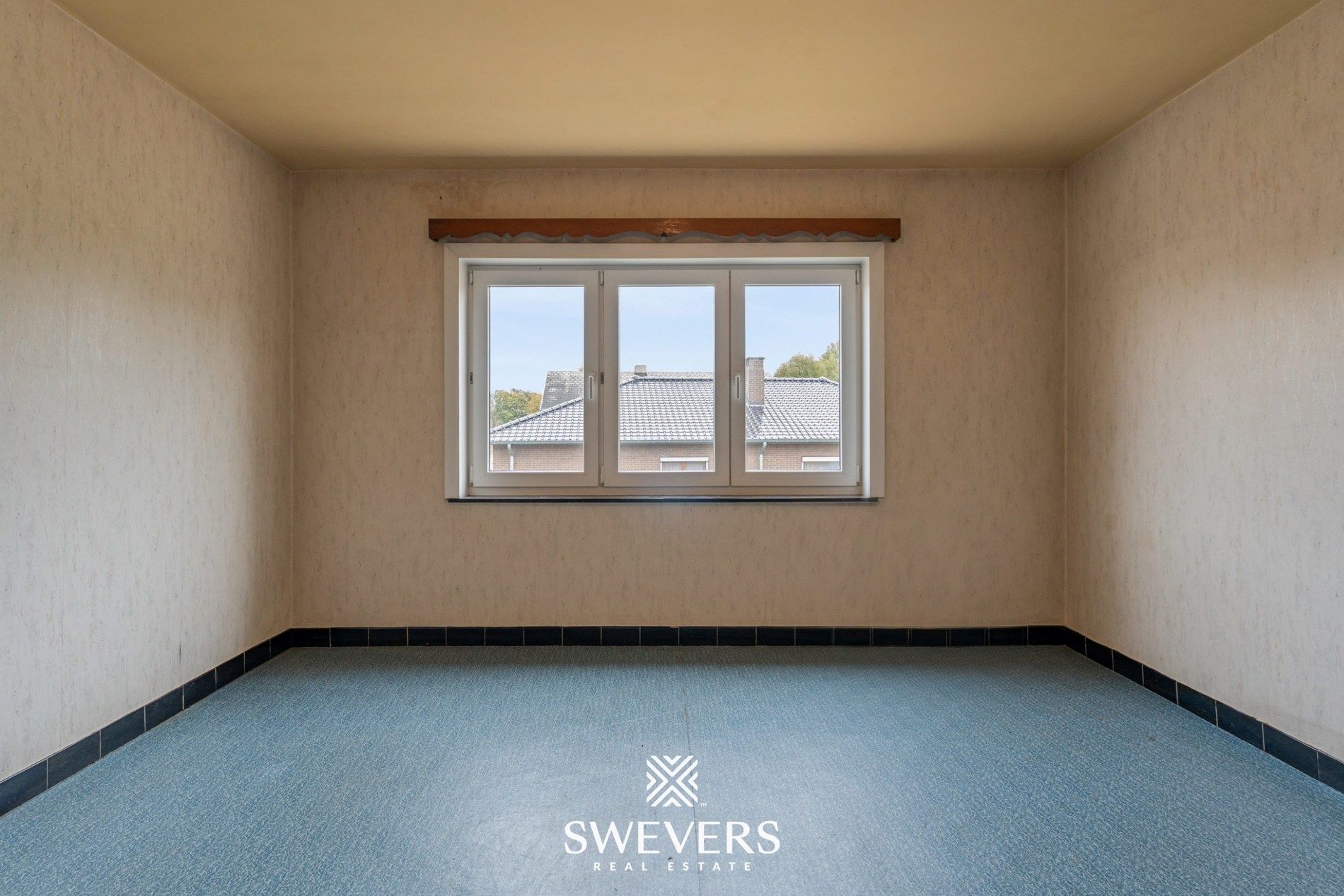 Ruime open bebouwing met potentieel en zuidgerichte tuin in rustige wijk van Houthalen foto 16