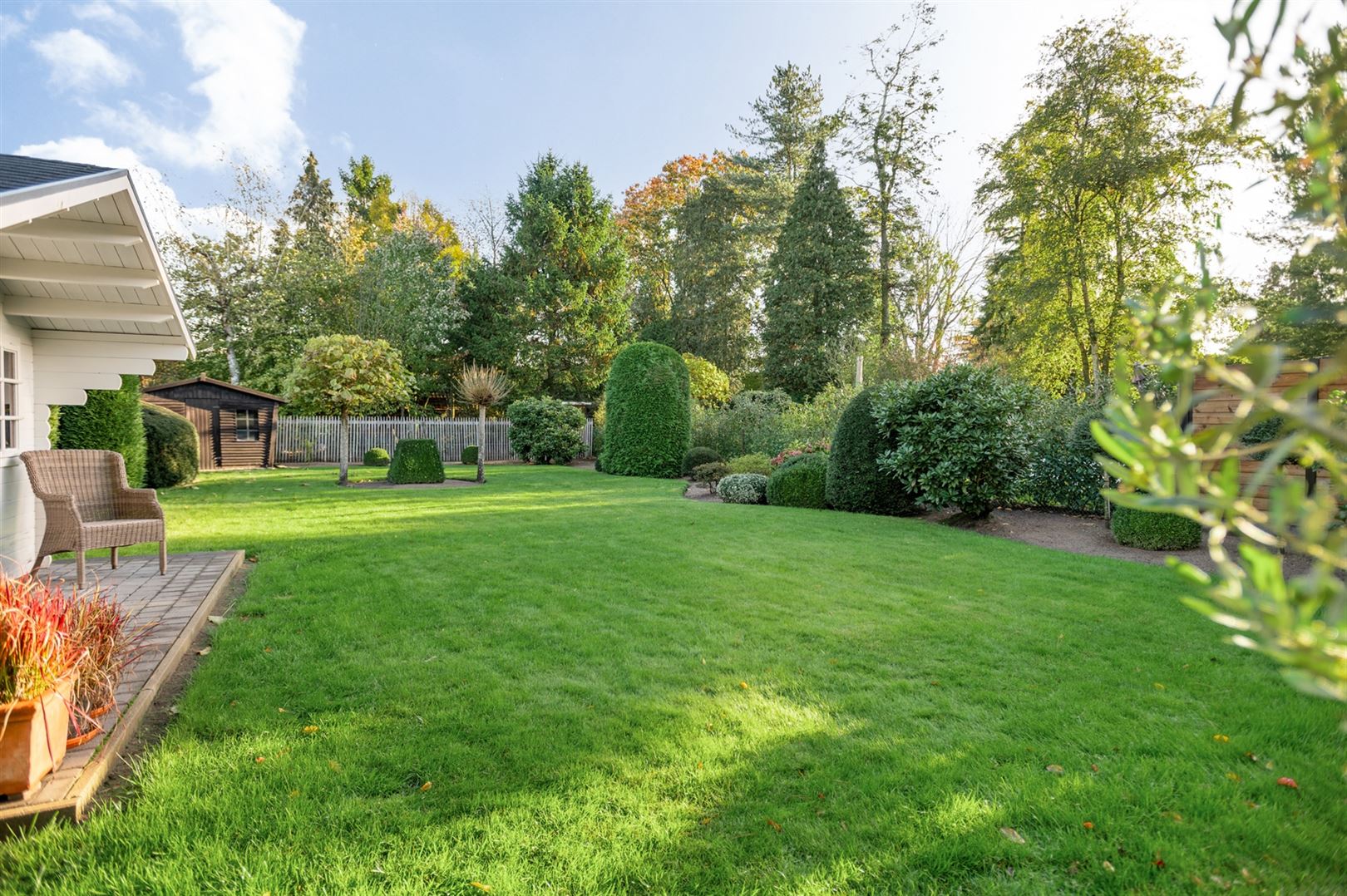 Prima onderhouden woning met 4 slaapkamers en prachtige tuin. foto 4