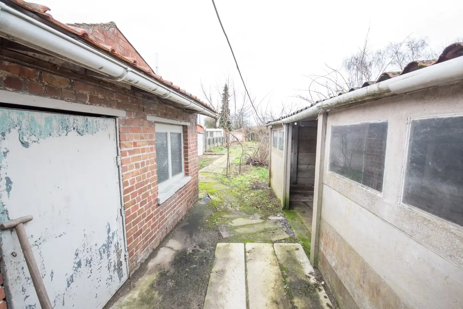 Te koop in Waregem – Halfopen bebouwing met renovatiepotentieel! foto 15